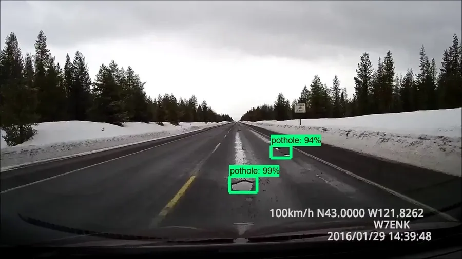 Realtime pothole detection via dashboard camera — 99% confidence, trained CV model